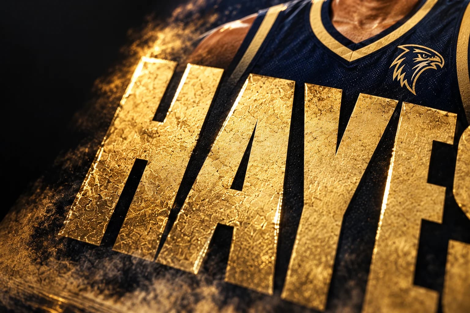 Close-up illustration of glossy spot UV and raised detail on gold basketball card lettering